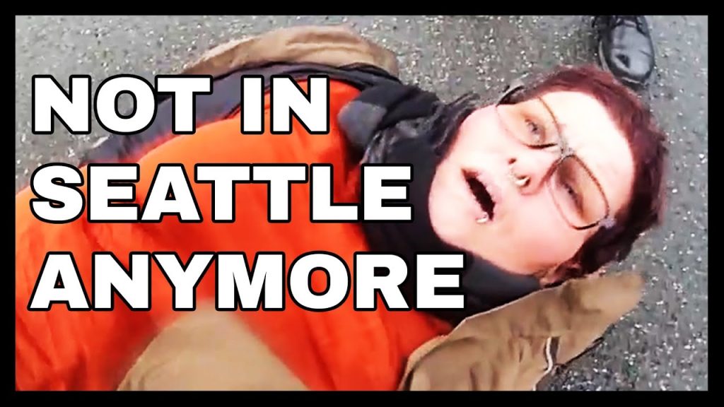 “This Isn’t Seattle”: Cops Have Hysterical Interaction With Purple-Haired Woman